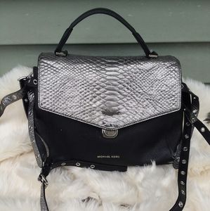 Michael Kors black and silver leather bag.